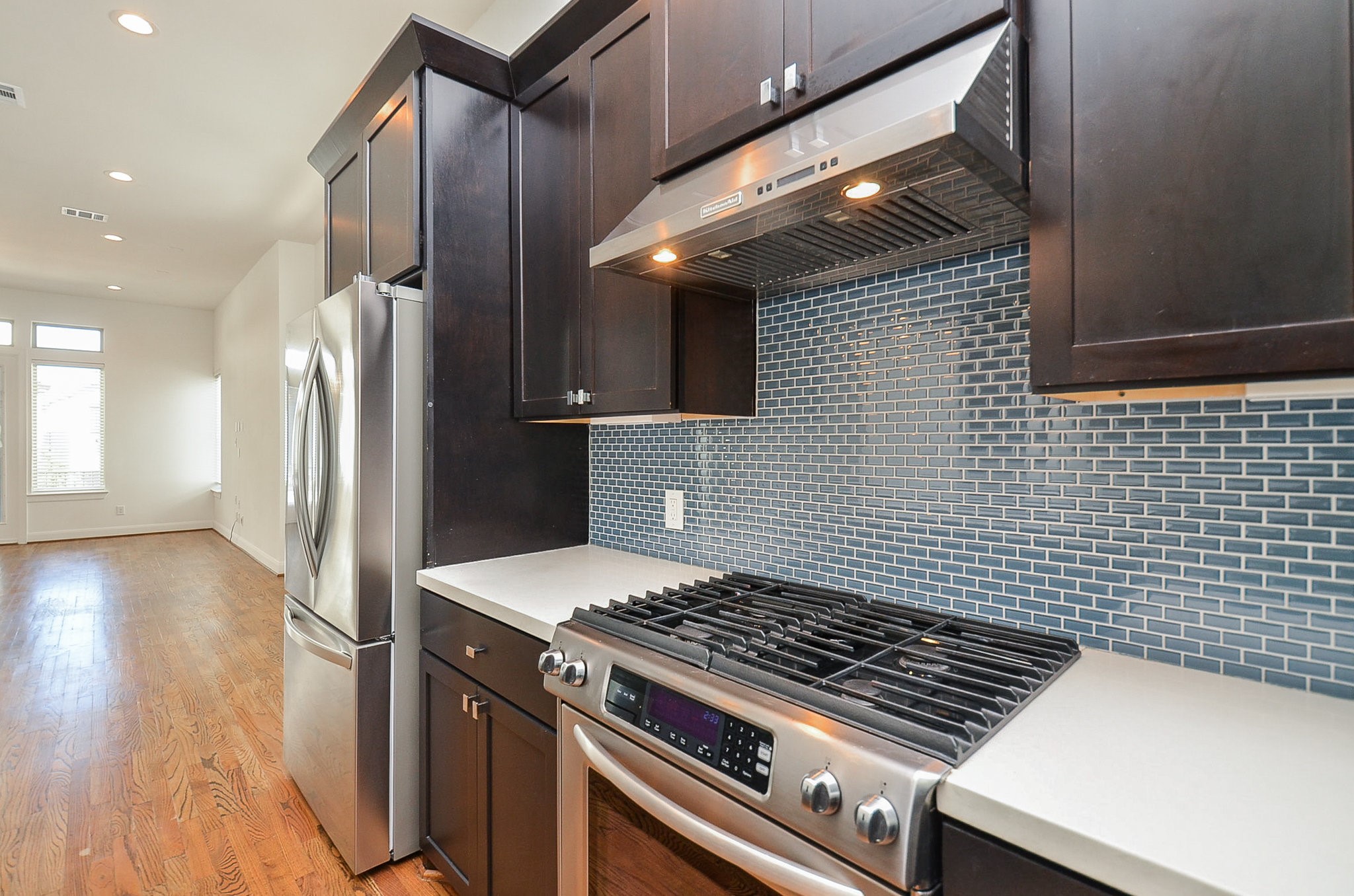 1245A Bonner Street, Unit B Houston, TX 77007 - Photo 15 of 36 a stove top oven sitting inside of a kitchen