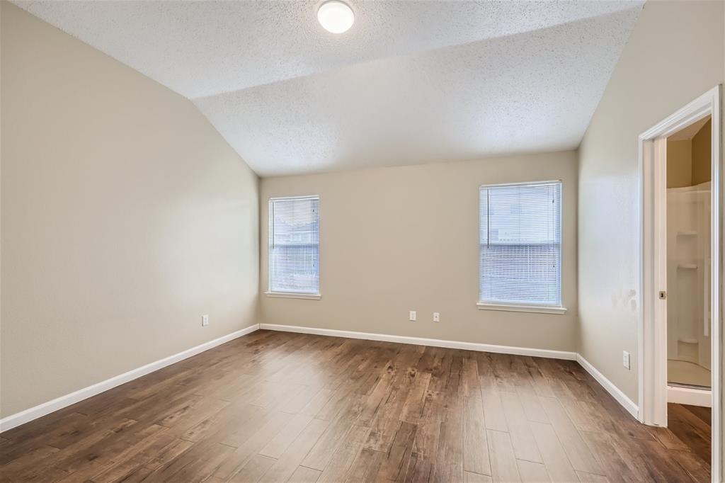 2210 Sumac Drive Forney, TX 75126 - Photo 11 of 20 an empty room with wooden floor and window