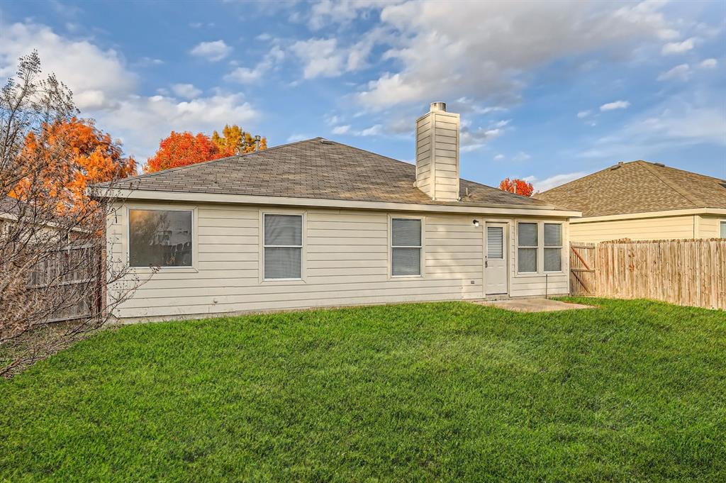 2210 Sumac Drive Forney, TX 75126 - Photo 20 of 20 a front view of a house with a garden