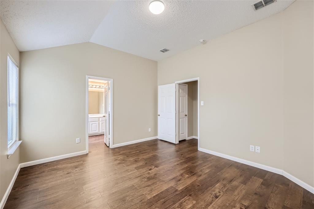 2210 Sumac Drive Forney, TX 75126 - Photo 10 of 20 a view of an empty room and wooden floor