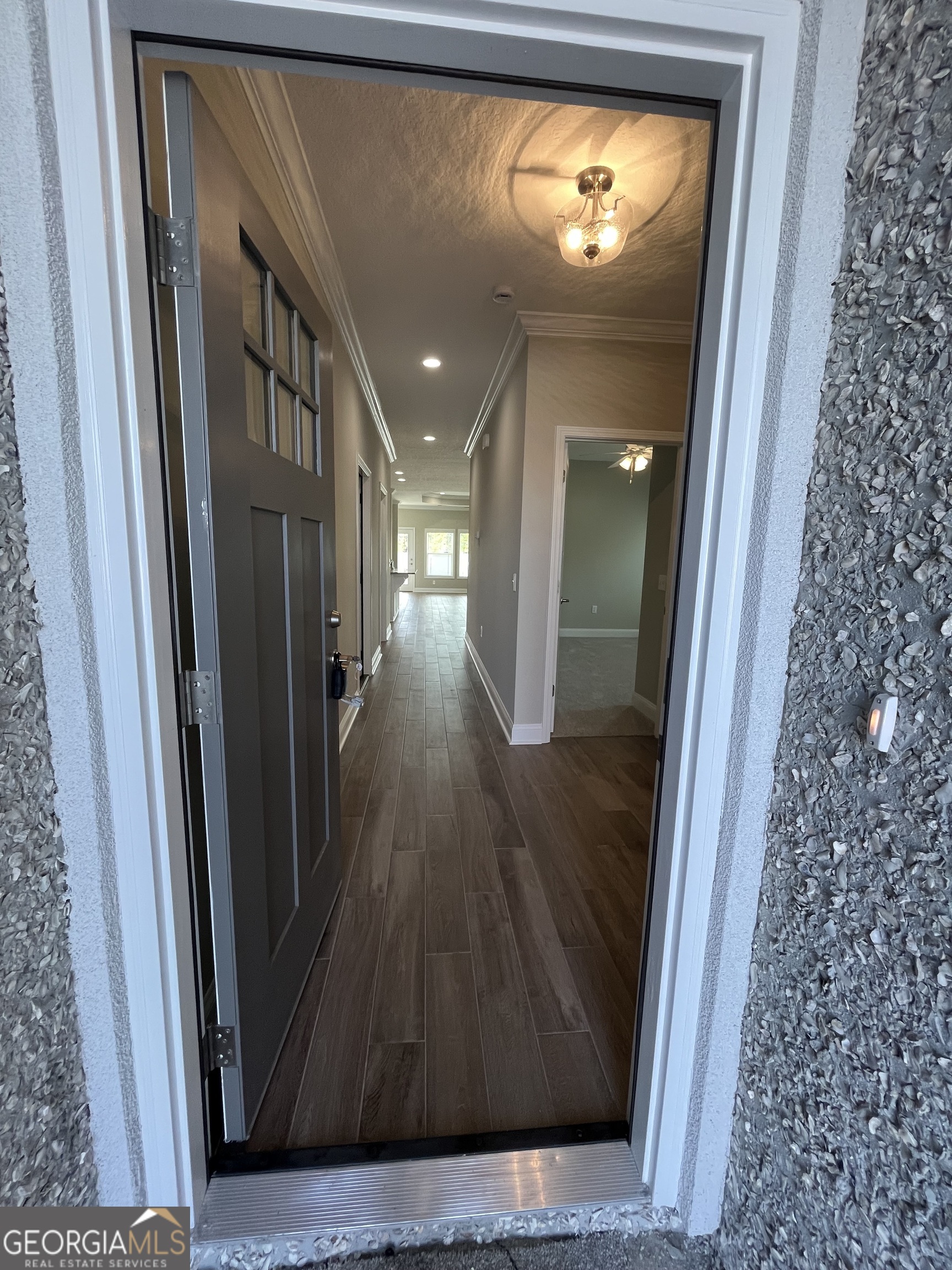 160 The Villas Way Kingsland, GA 31548 - Photo 2 of 65 a view of a hallway