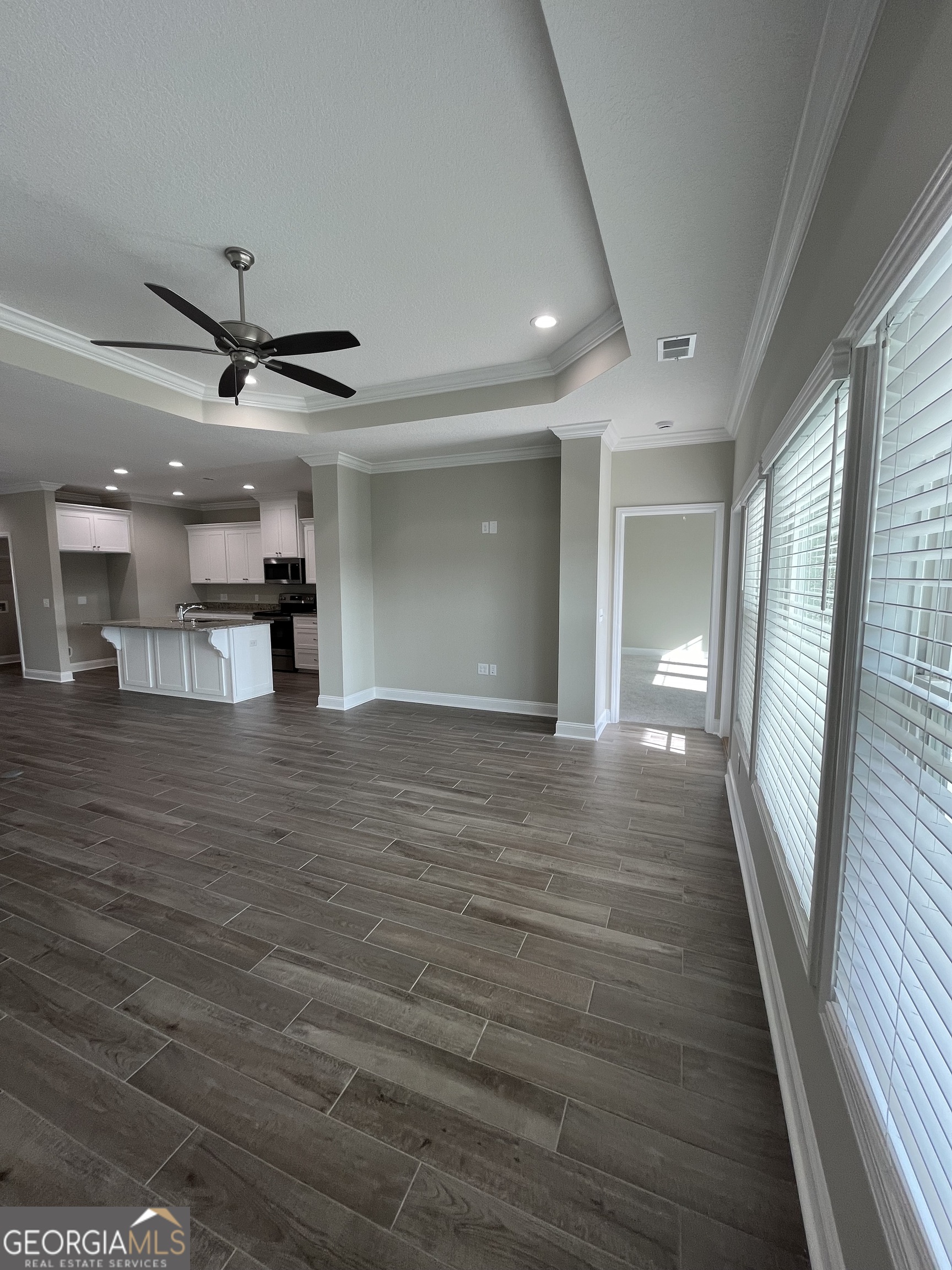 160 The Villas Way Kingsland, GA 31548 - Photo 25 of 65 a view of a hallway with a kitchen
