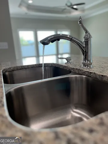 a bathroom with a double vanity sink and mirror