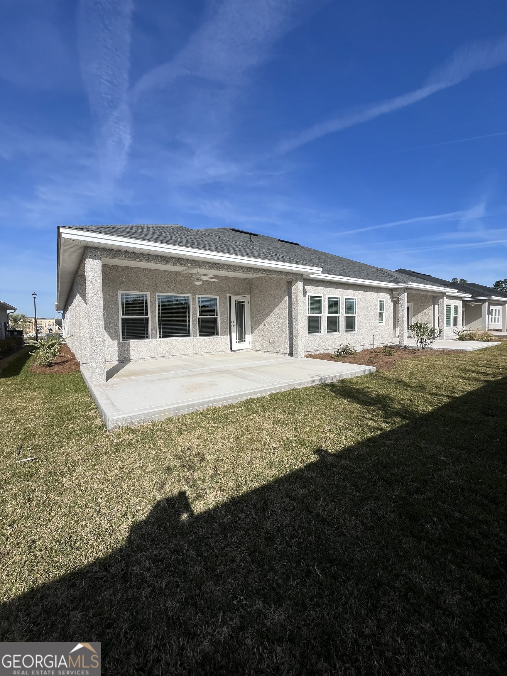 160 The Villas Way Kingsland, GA 31548 - Photo 54 of 65 a view of a house with pool and sitting area