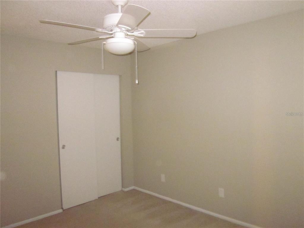 2456 Ecuadorian Way, Unit 46 Clearwater, FL 33763 - Photo 16 of 65 a view of a small space with a chandelier fan