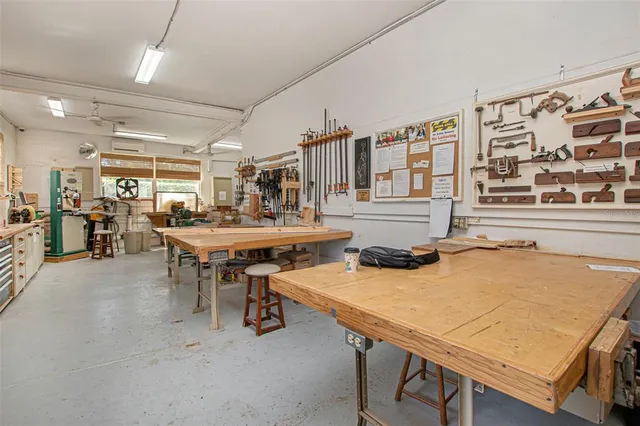 a view of a workspace with furniture