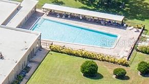 2456 Ecuadorian Way, Unit 46 Clearwater, FL 33763 - Photo 64 of 65 a view of a small pool with an outdoor space