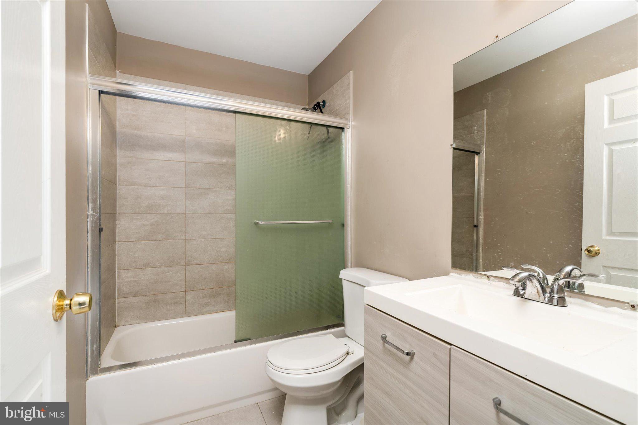355 Leonard Avenue Hamilton, NJ 08619 - Photo 19 of 34 a bathroom with a sink toilet and shower