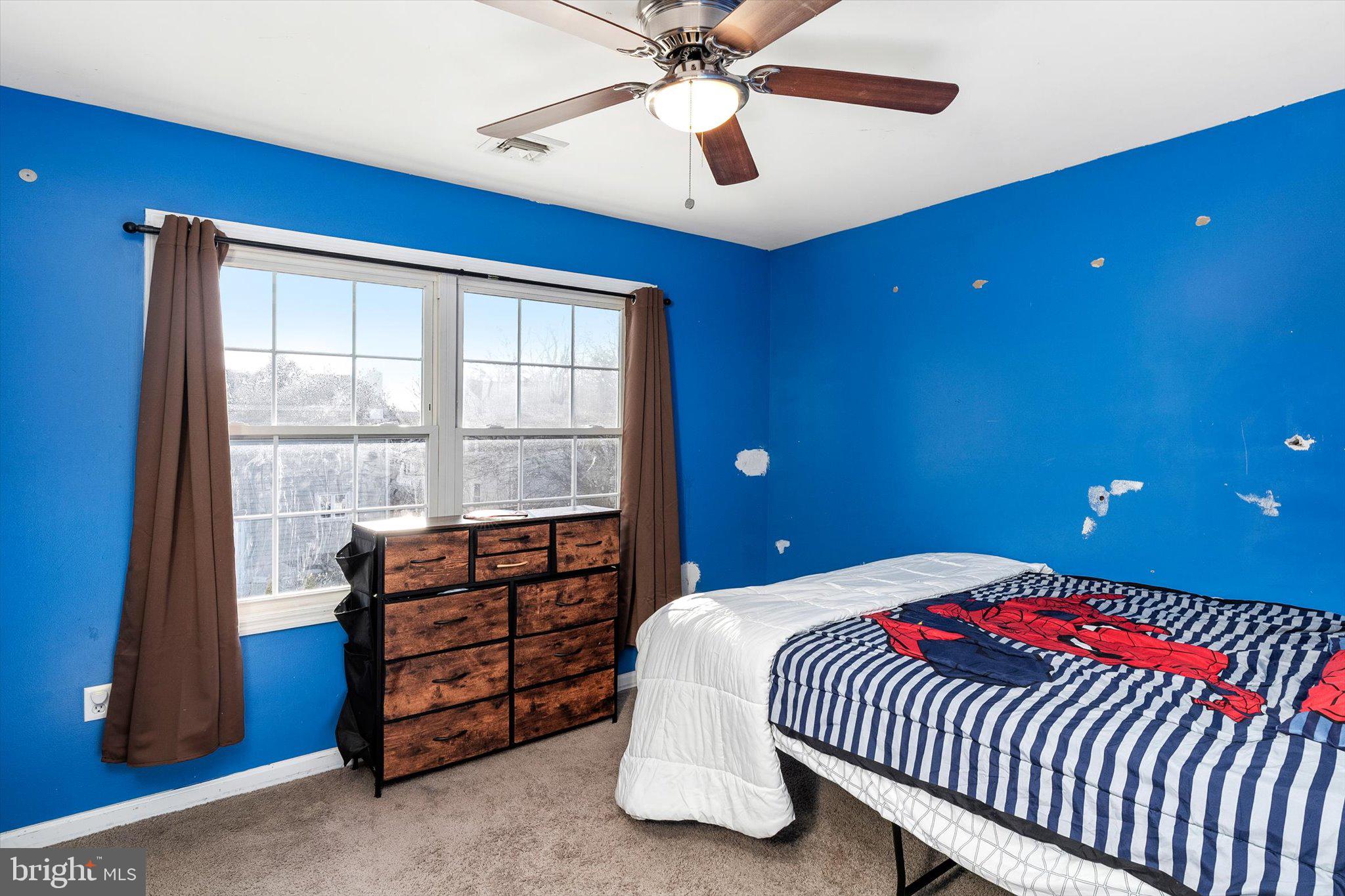 355 Leonard Avenue Hamilton, NJ 08619 - Photo 21 of 34 a bedroom with a bed and a window