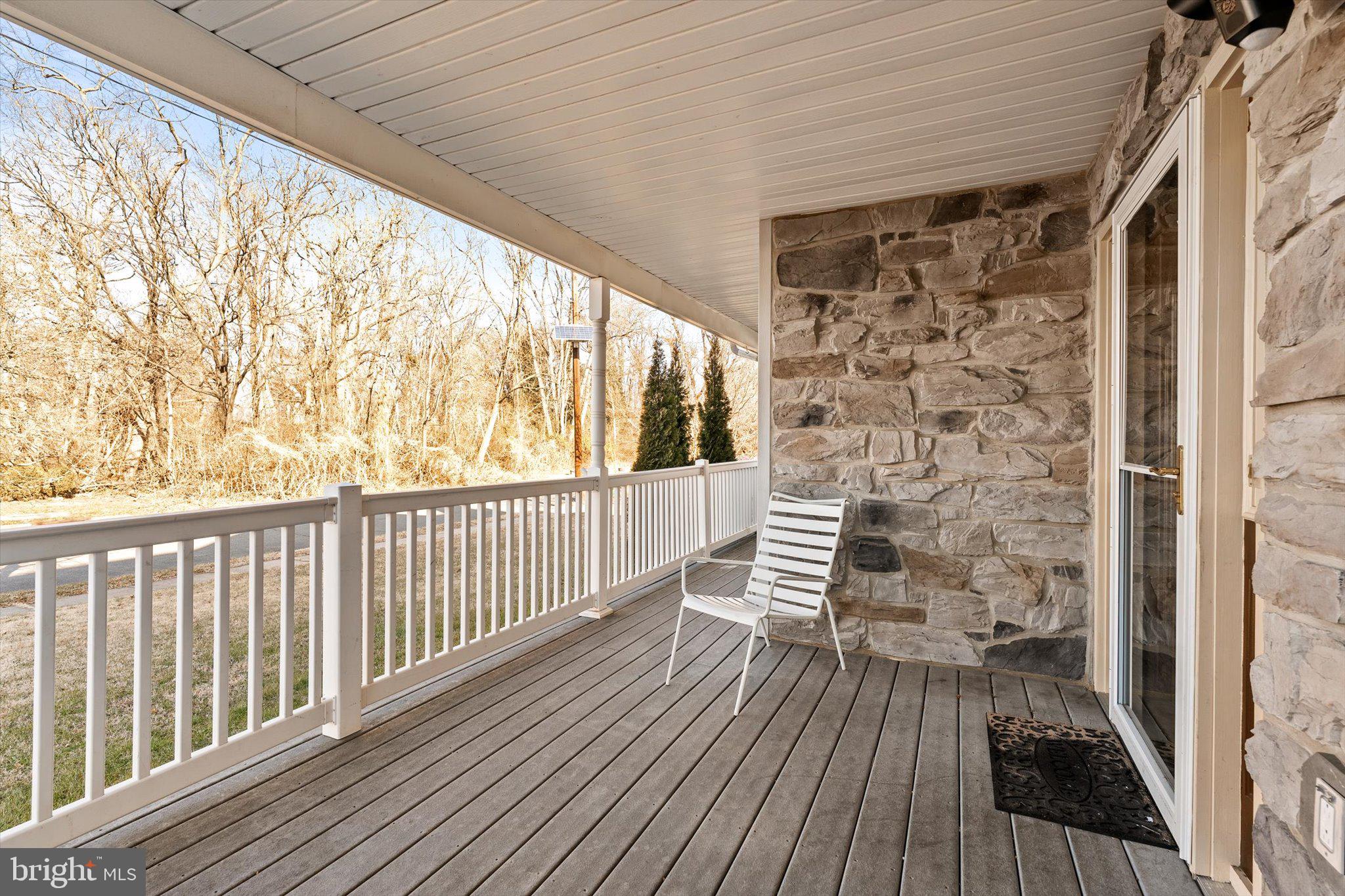 355 Leonard Avenue Hamilton, NJ 08619 - Photo 3 of 34 a view of a balcony with wooden floor