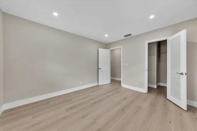 a bathroom with a sink double vanity and a bathtub