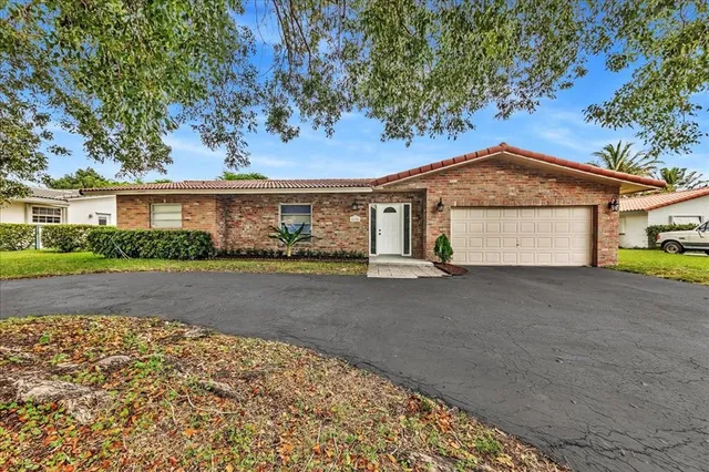 front view of a house with a street