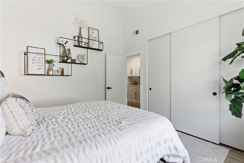 23281 Atlantis Way Dana Point, CA 92629 - Photo 48 of 81 a bedroom with a bed and a dresser