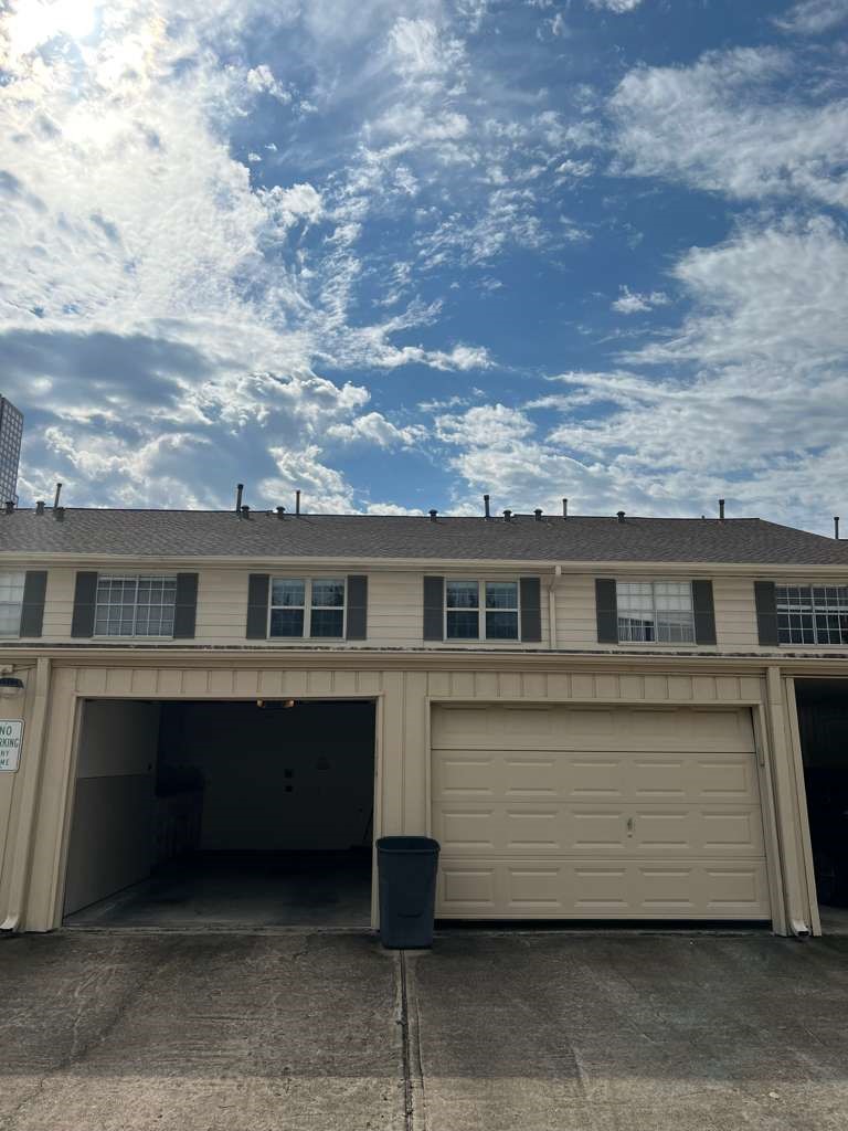5817 Valley Forge Drive, Unit 90 Houston, TX 77057 - Photo 11 of 21 front view of a house with a yard