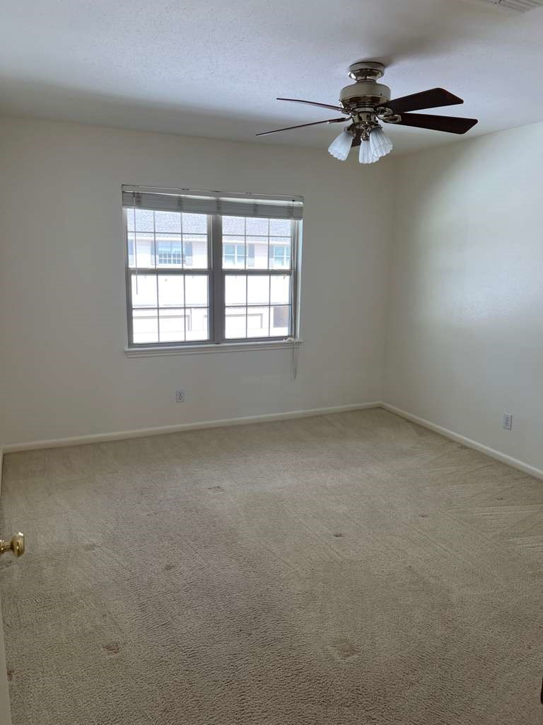 5817 Valley Forge Drive, Unit 90 Houston, TX 77057 - Photo 17 of 21 an empty room with a window