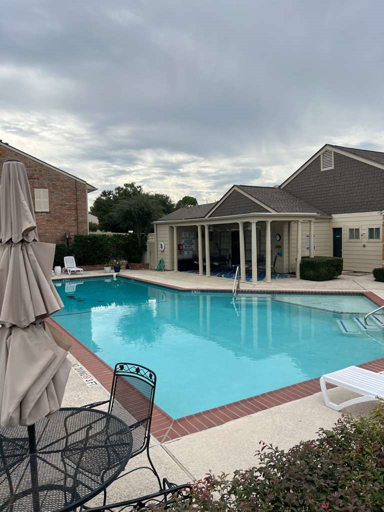 5817 Valley Forge Drive, Unit 90 Houston, TX 77057 - Photo 21 of 21 a view of a house with a swimming pool