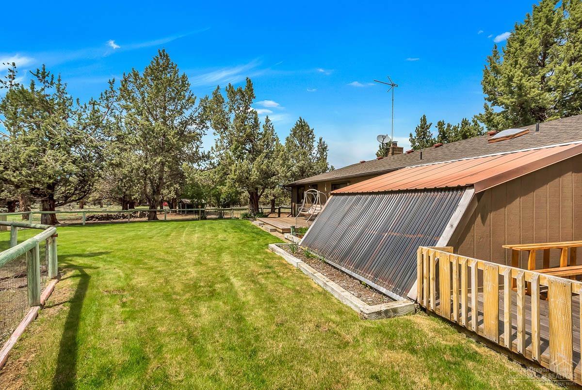 64729 Sylvan Loop Bend, OR 97701 - Photo 21 of 25 a view of a backyard with swimming pool