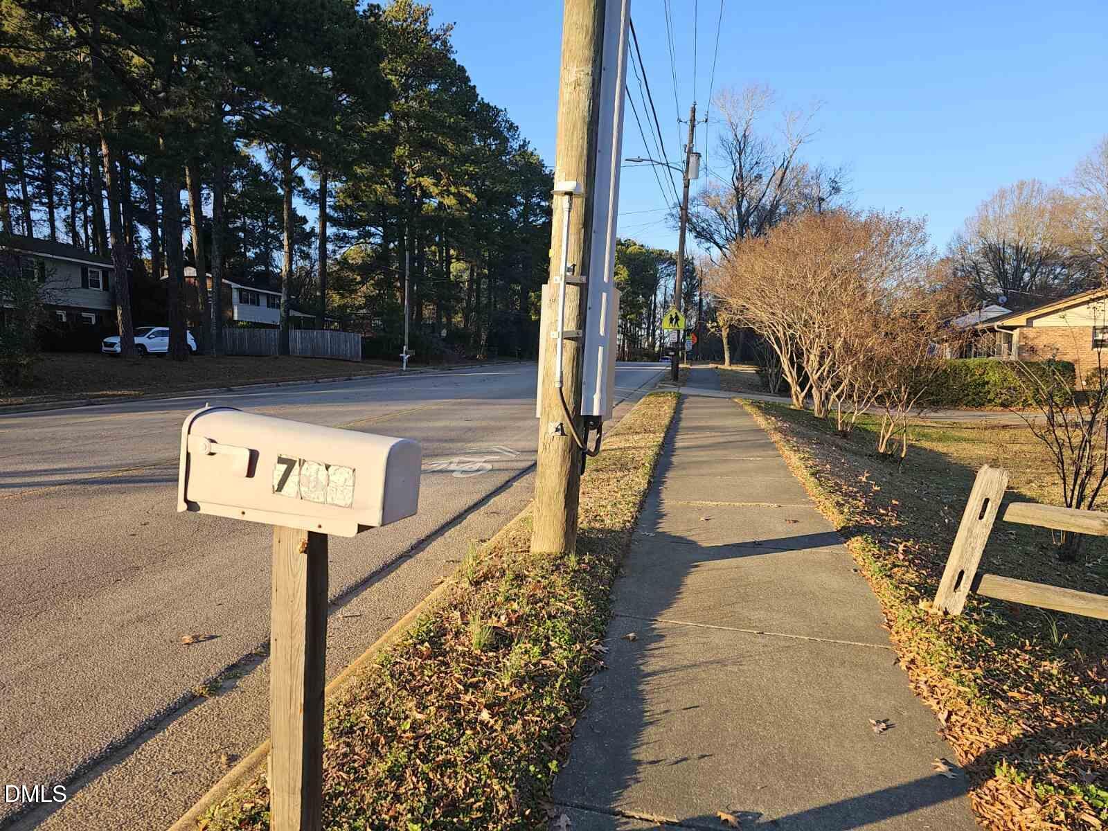 711 Kildaire Farm Road Cary, NC 27511 - Photo 6 of 6 a sign board with parking space