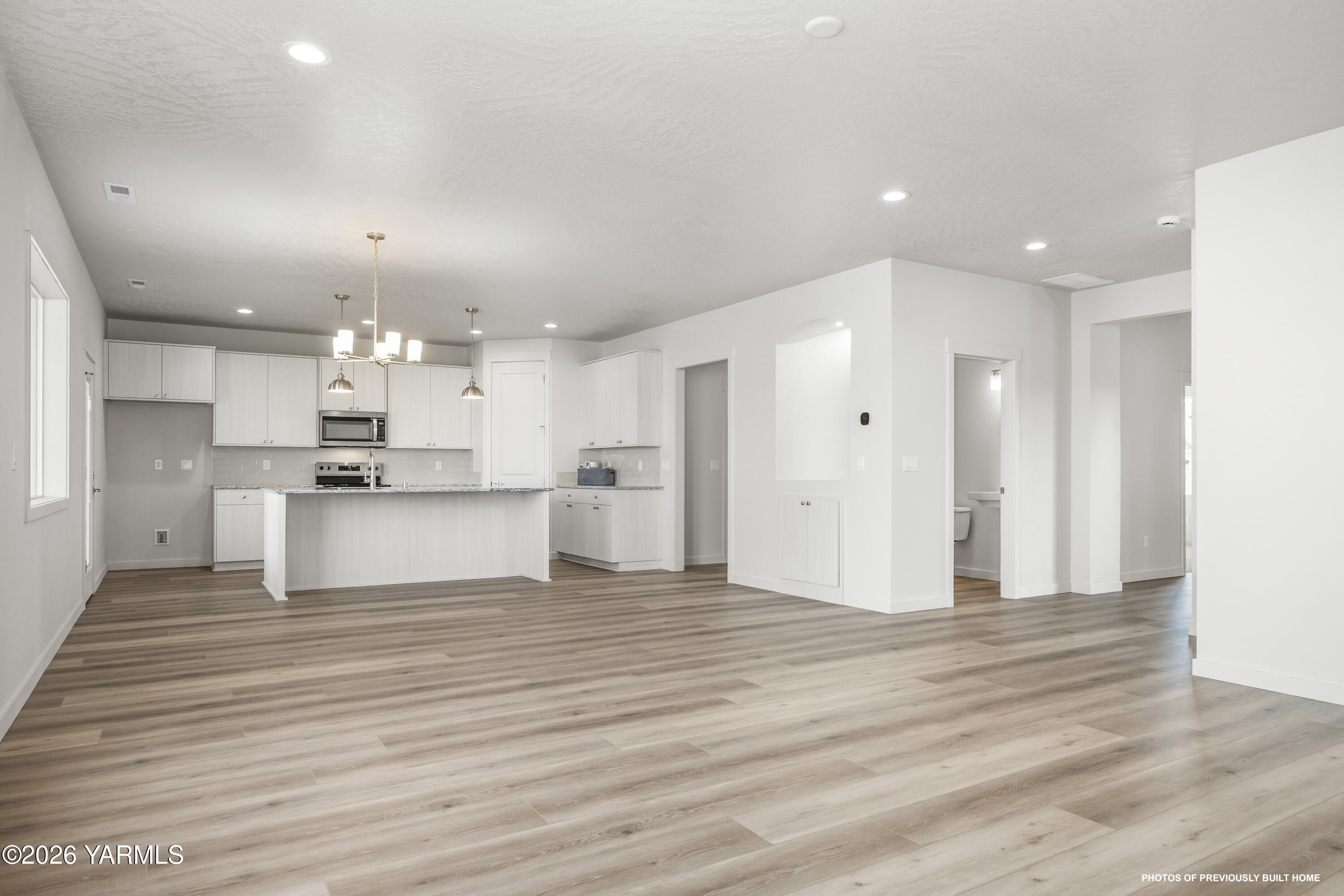 215 Packer Street Prosser, WA 99350 - Photo 2 of 18 211 Schrute Rd 9.23.25 31 copy