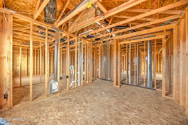 a view of kitchen with wooden floor and window