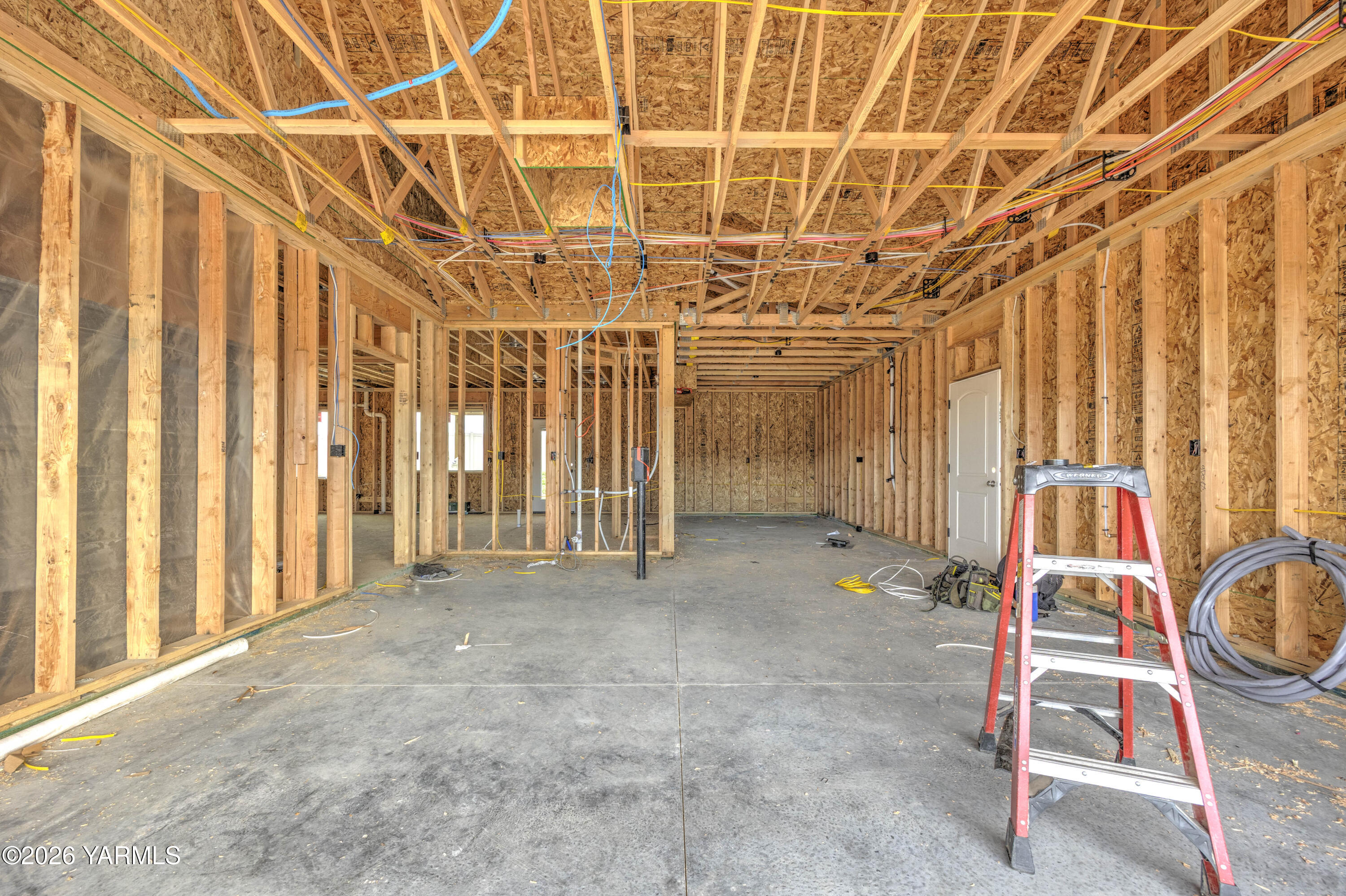 215 Packer Street Prosser, WA 99350 - Photo 23 of 38 a view of a room with lots of windows