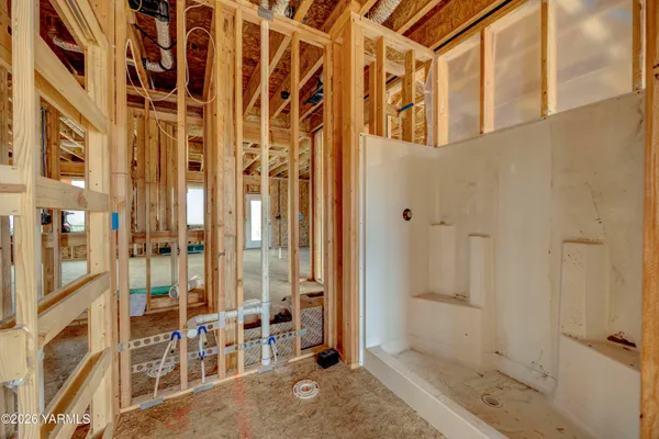 front view of a room with a large window