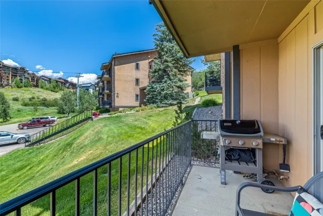 a view of a porch with furniture