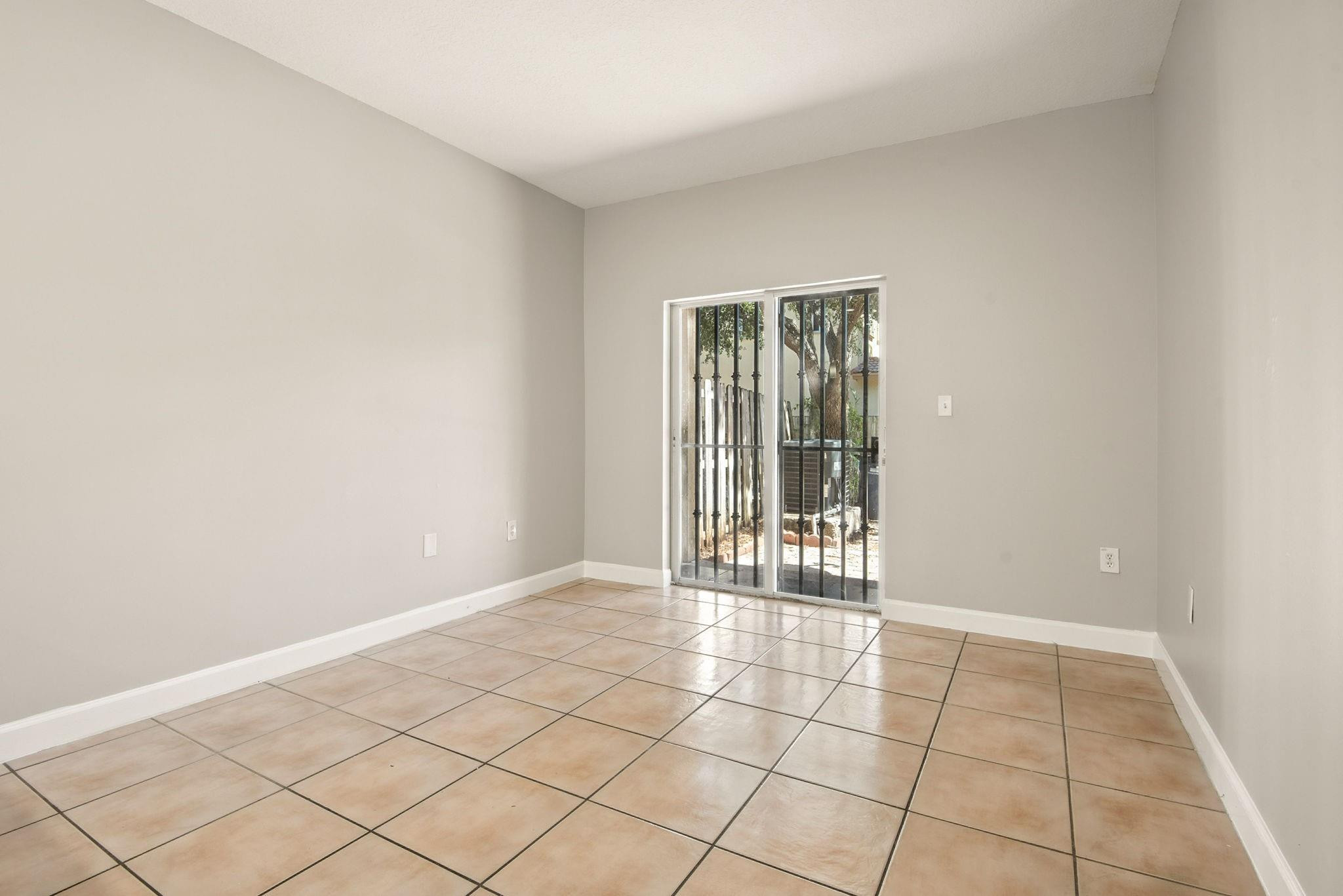 11368 Southwest 230th Terrace Miami, FL 33170 - Photo 15 of 37 a view of an empty room and window