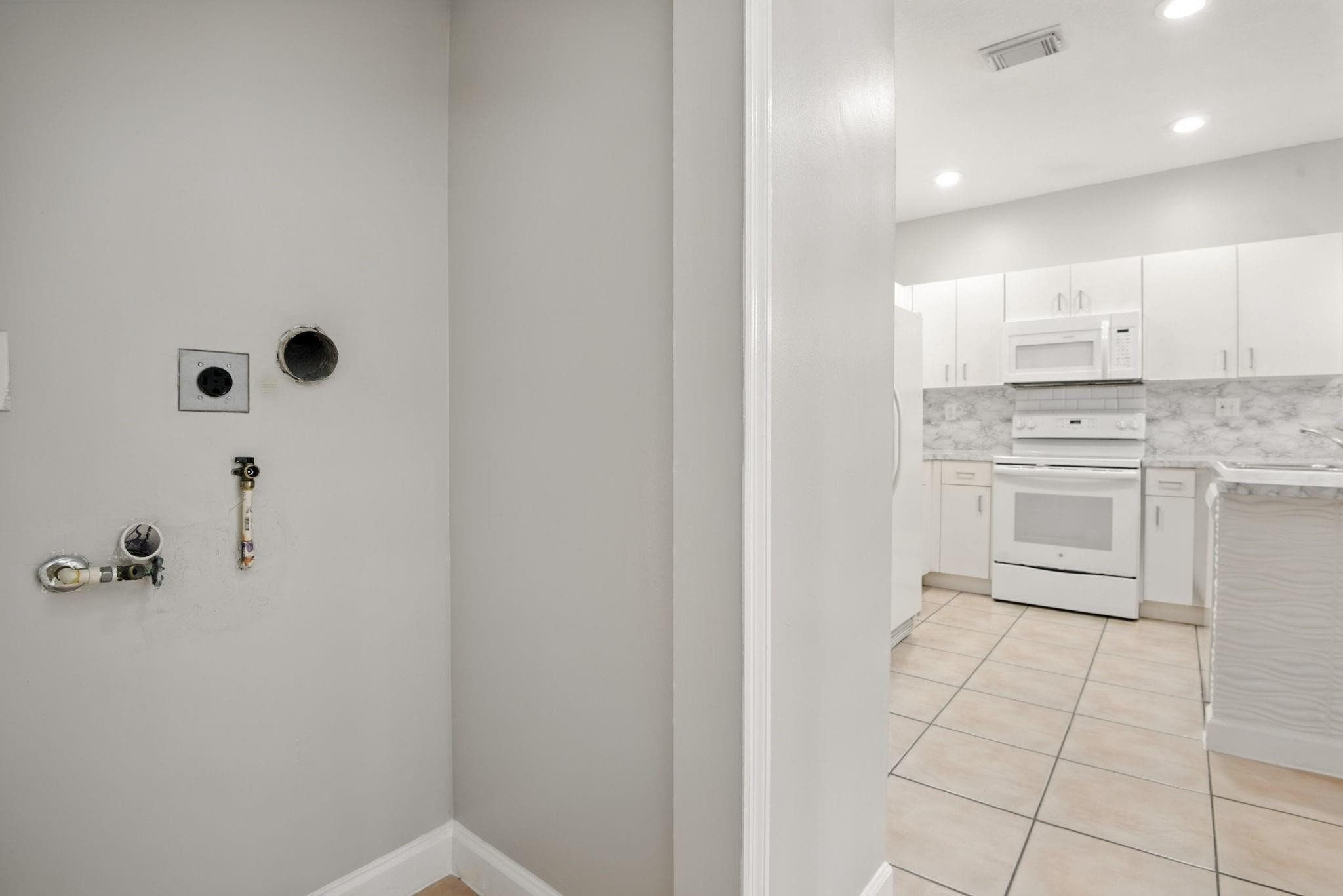 11368 Southwest 230th Terrace Miami, FL 33170 - Photo 18 of 37 a bathroom with a sink a toilet and mirror
