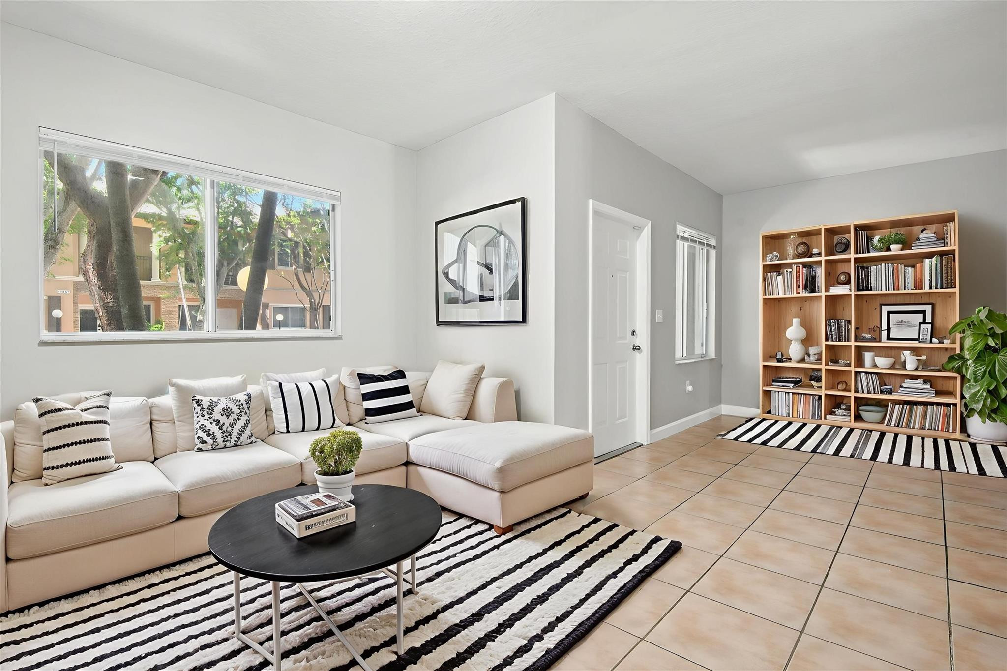 11368 Southwest 230th Terrace Miami, FL 33170 - Photo 2 of 37 a living room with furniture and a window
