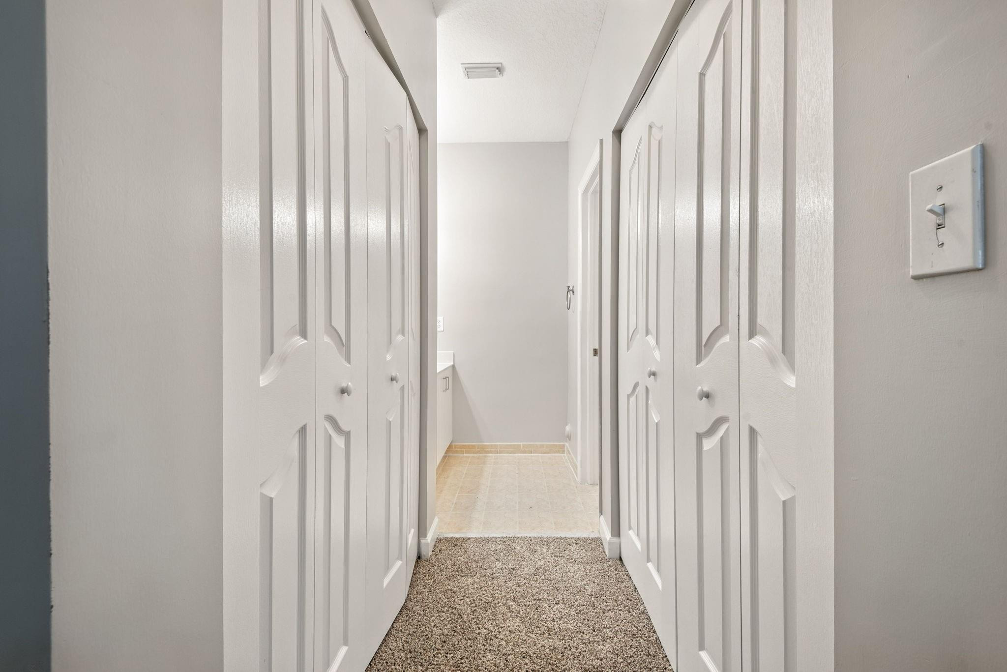 11368 Southwest 230th Terrace Miami, FL 33170 - Photo 23 of 37 a view of a bathroom from the hallway