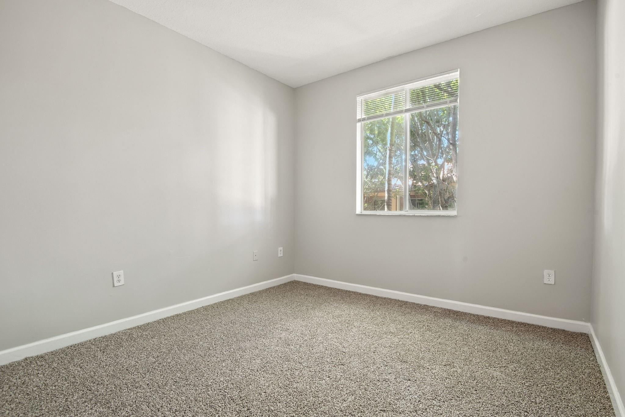11368 Southwest 230th Terrace Miami, FL 33170 - Photo 29 of 37 an empty room with a window