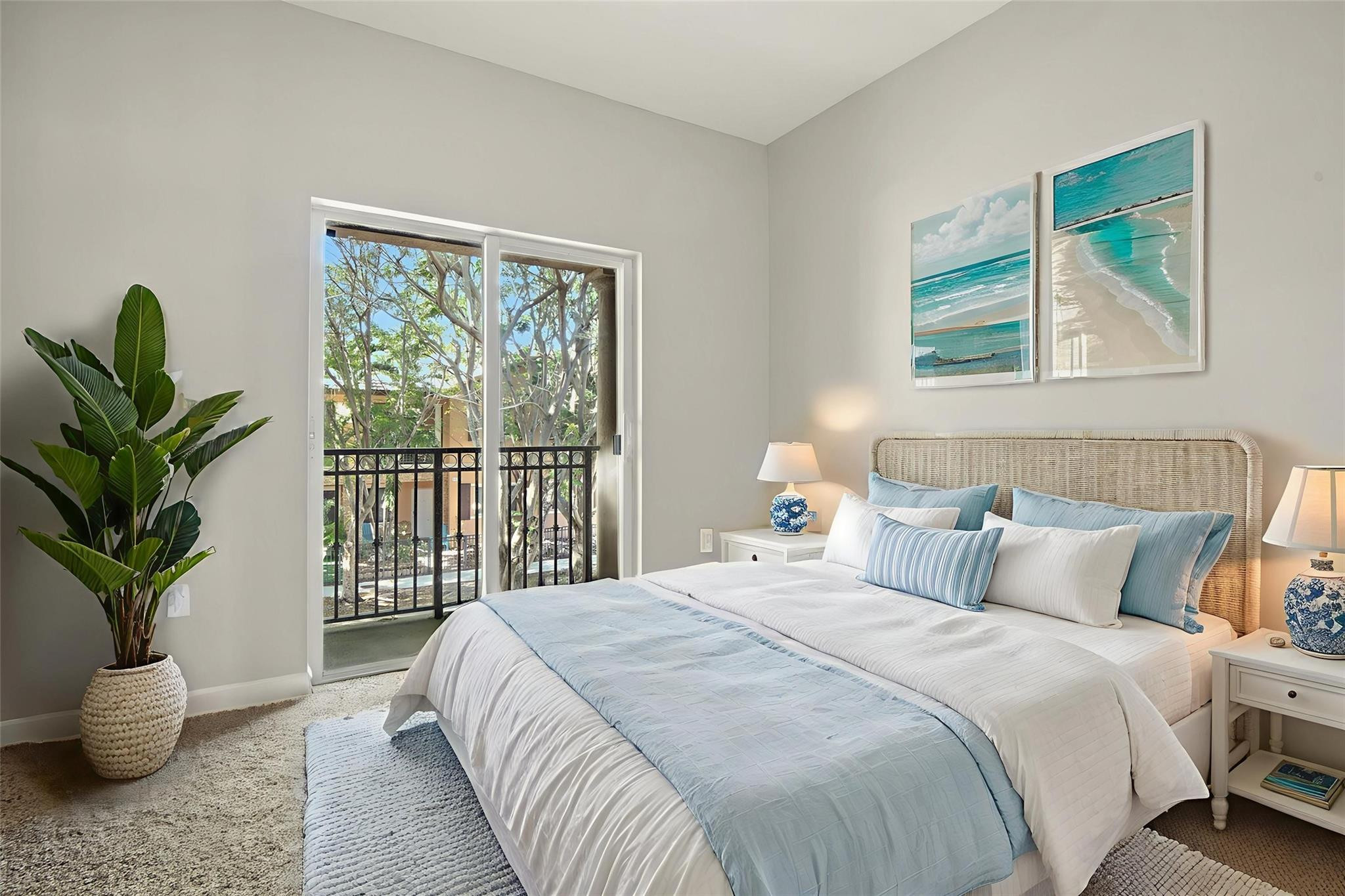 11368 Southwest 230th Terrace Miami, FL 33170 - Photo 6 of 37 a bedroom with a large bed and a potted plant