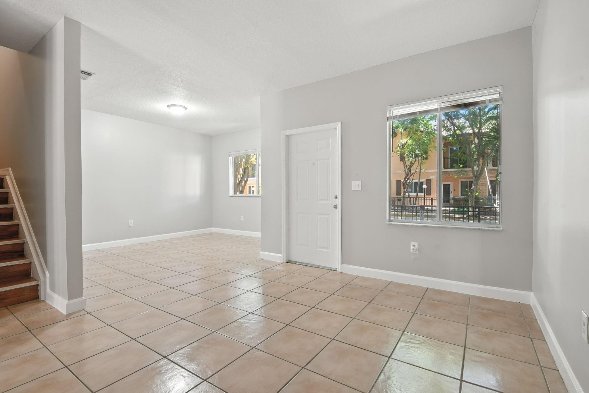 11368 Southwest 230th Terrace Miami, FL 33170 - Photo 10 of 37 a view of an empty room and window
