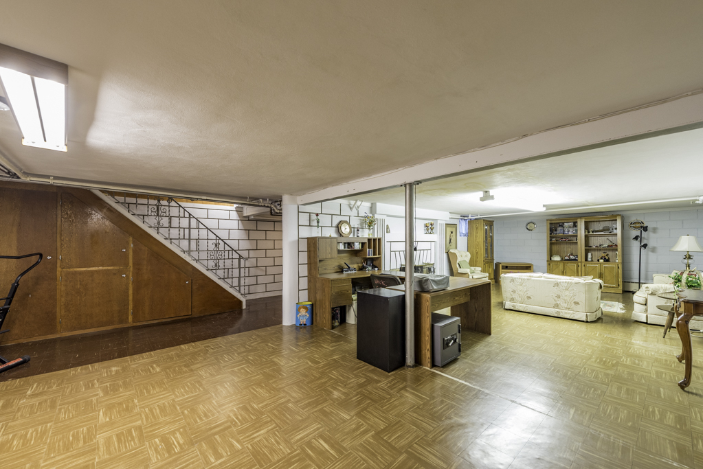 1118 Shiloh Boulevard Zion, IL 60099 - Photo 22 of 33 a living room with stainless steel appliances furniture and a kitchen view