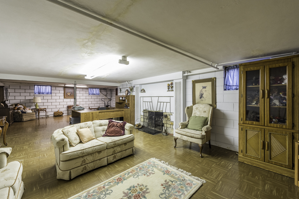 1118 Shiloh Boulevard Zion, IL 60099 - Photo 24 of 33 a living room with furniture and a fireplace