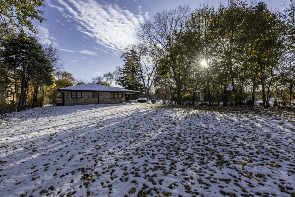 1118 Shiloh Boulevard Zion, IL 60099 - Photo 30 of 33 a front view of a house with a yard