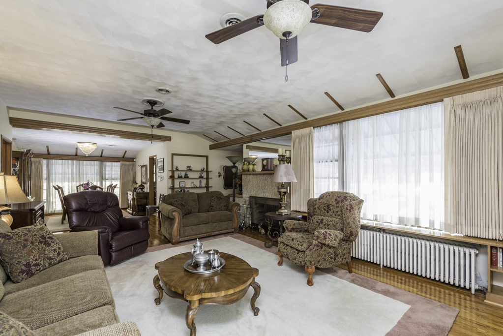 1118 Shiloh Boulevard Zion, IL 60099 - Photo 9 of 33 a living room with furniture and a large window