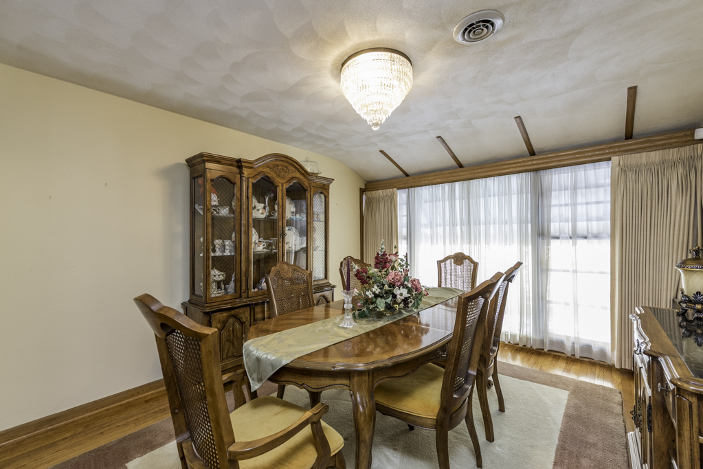 1118 Shiloh Boulevard Zion, IL 60099 - Photo 10 of 33 a dining room with furniture and window
