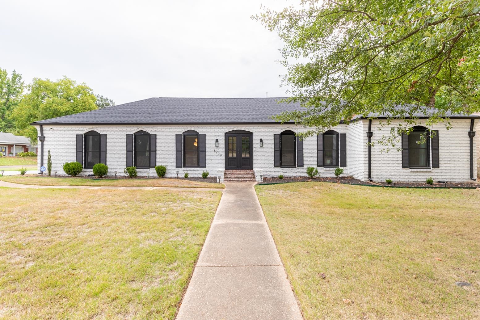 6270 Quince Road Memphis, TN 38119 - Photo 1 of 28 View of front of house featuring a front yard