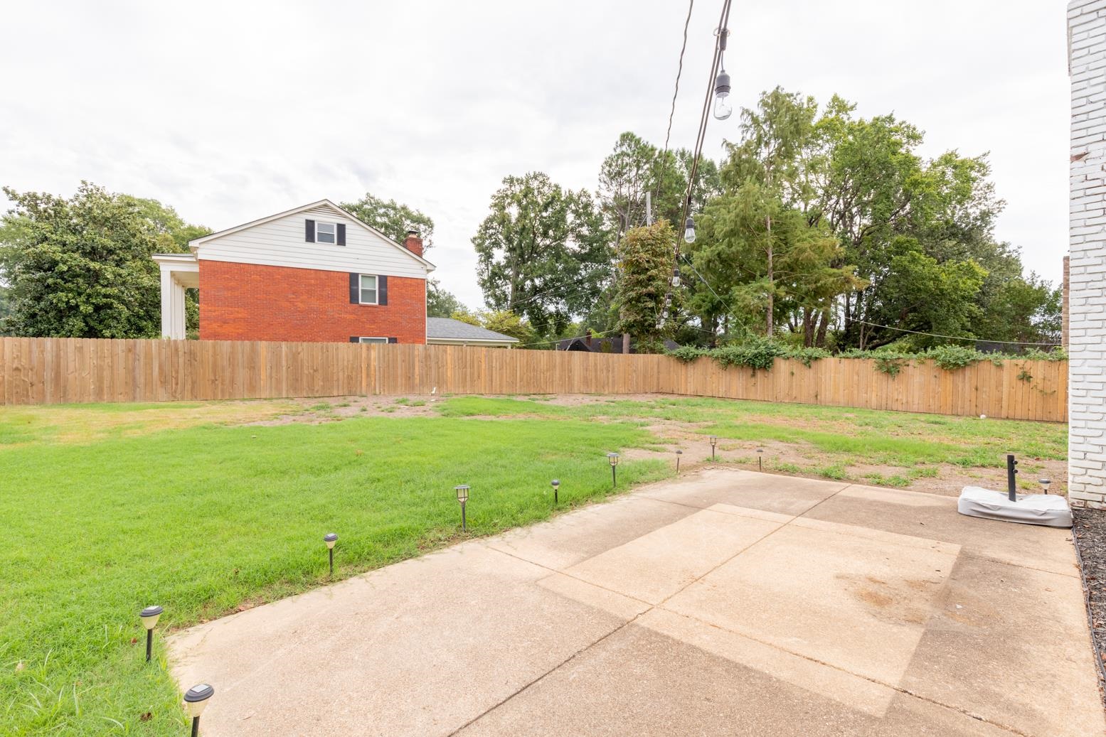6270 Quince Road Memphis, TN 38119 - Photo 25 of 28 View of yard featuring a patio