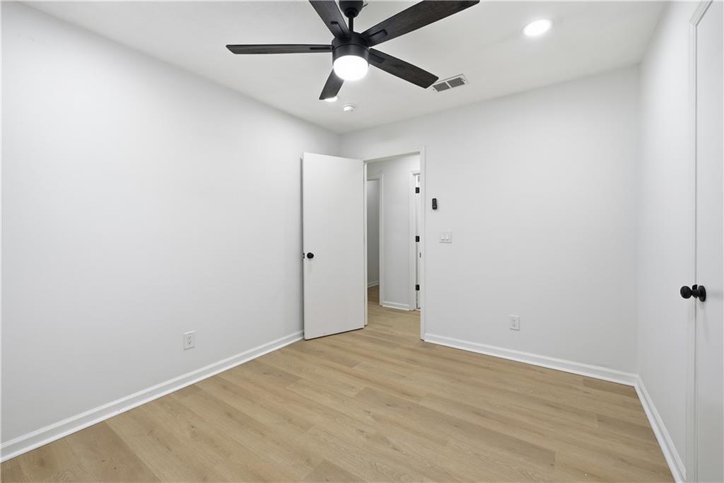 2095 Mulkey Road Southwest Marietta, GA 30008 - Photo 19 of 32 a view of an empty room