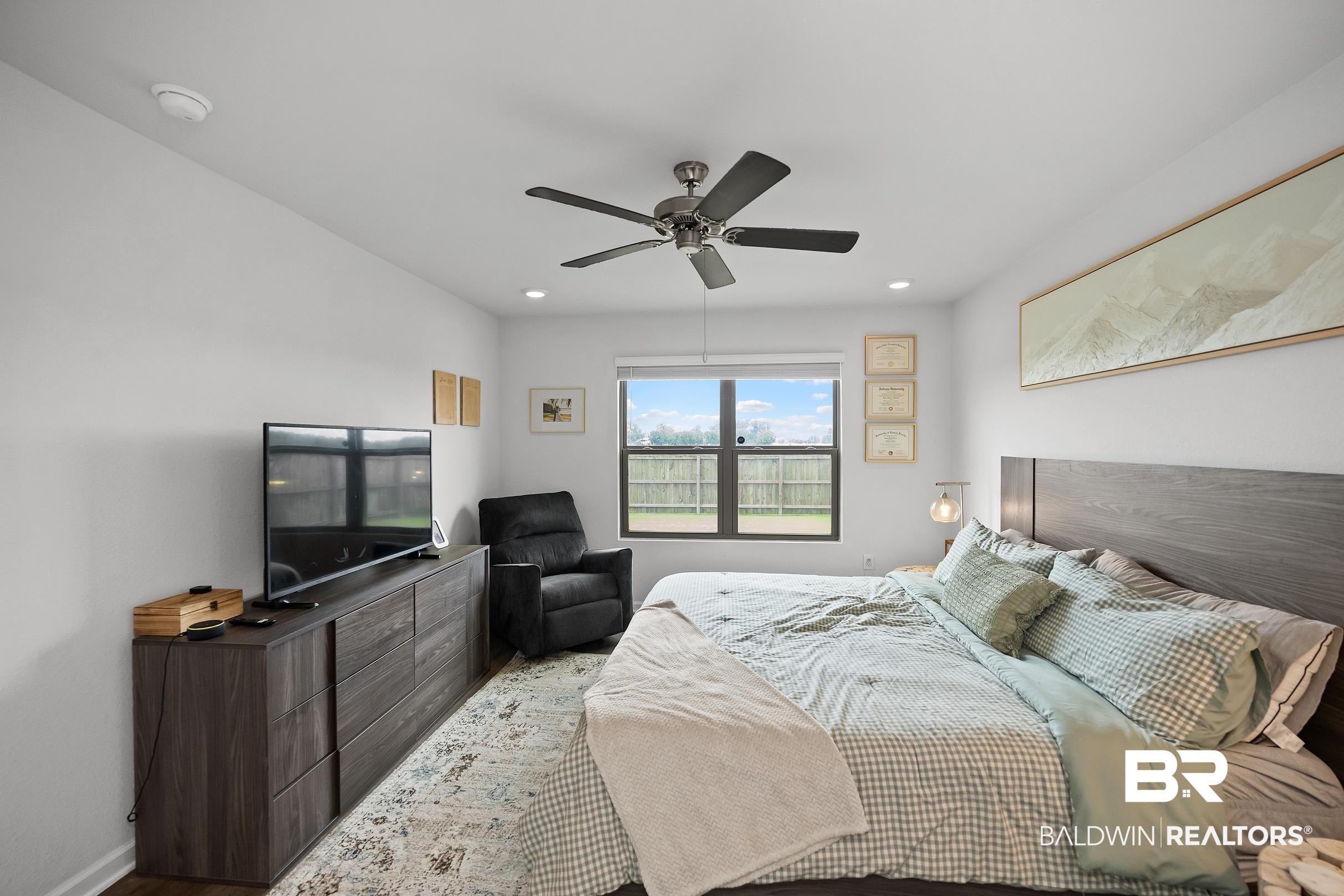 32030 Terranova Loop Lillian, AL 36549 - Photo 11 of 30 Bedroom featuring a ceiling fan with integrated lighting, recessed ceiling lights, and a window with backyard views