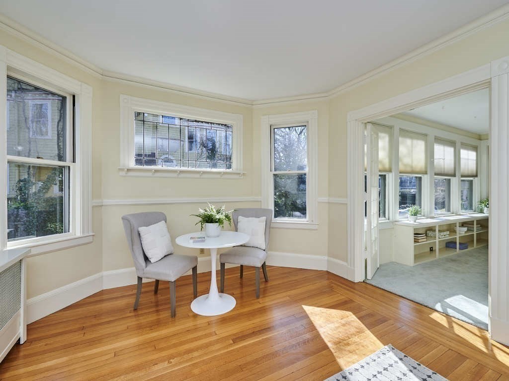 32 Lenox Street Newton, MA 02465 - Photo 12 of 36 a view of a dining room with furniture a rug and wooden floor