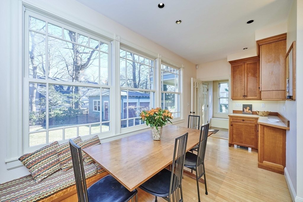 32 Lenox Street Newton, MA 02465 - Photo 16 of 36 a view of a dining room with furniture and wooden floor
