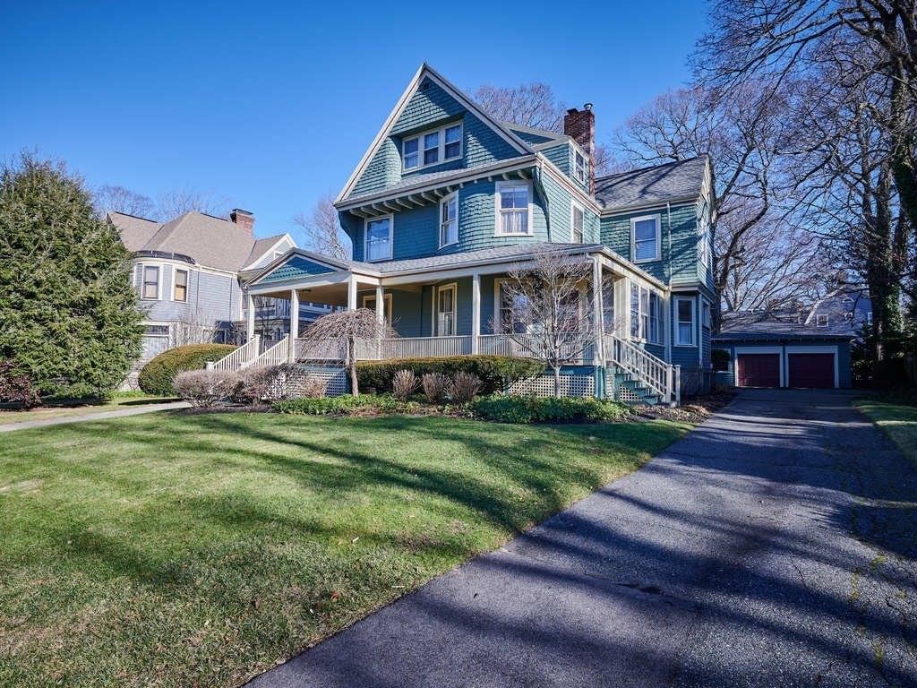 32 Lenox Street Newton, MA 02465 - Photo 2 of 36 a front view of a house with a yard