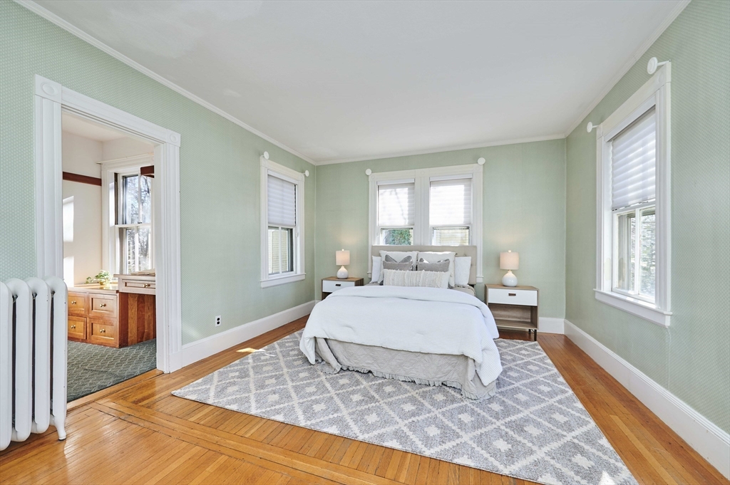 32 Lenox Street Newton, MA 02465 - Photo 22 of 36 a bedroom with a large bed and a window