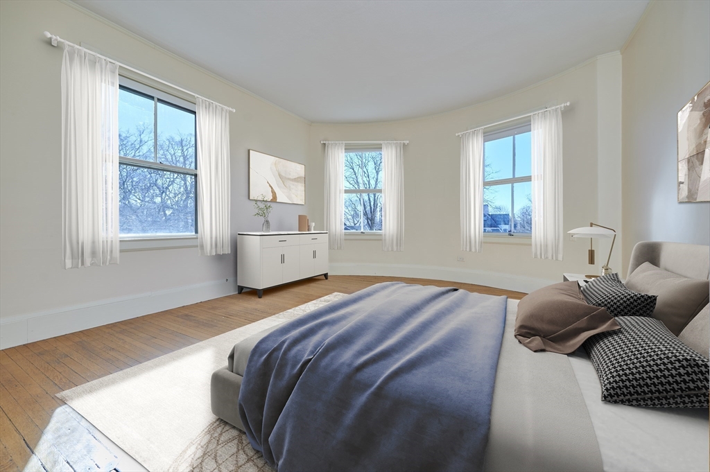 32 Lenox Street Newton, MA 02465 - Photo 28 of 36 a bedroom with bed couch and window