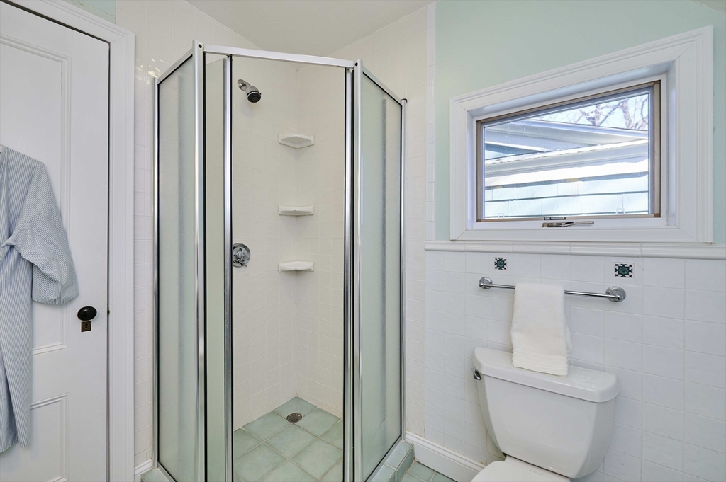 32 Lenox Street Newton, MA 02465 - Photo 32 of 36 a bathroom with a toilet and a shower