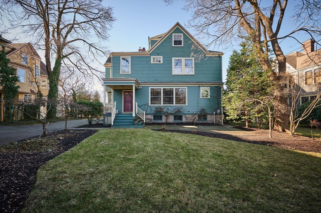 32 Lenox Street Newton, MA 02465 - Photo 35 of 36 a front view of a house with a yard